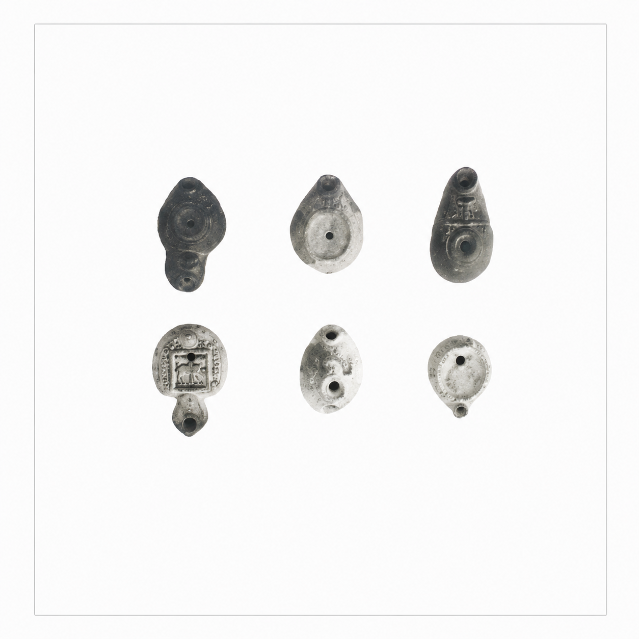Group of Six Figural and Symbolic Coptic Oil Lamps